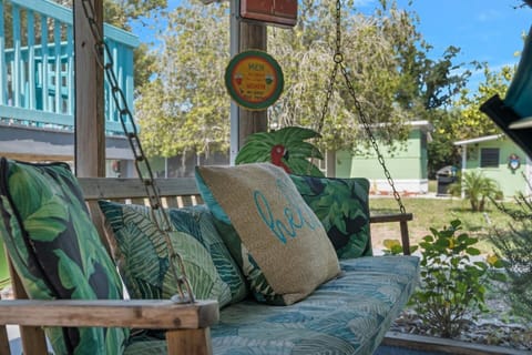 The porch swing in the lanai is the perfect spot to relax on a warm Florida day!