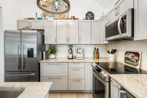 Stainless steel appliances and custom cabinetry