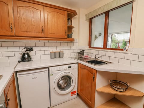 Fridge, electric kettle, toaster, cookware/dishes/utensils