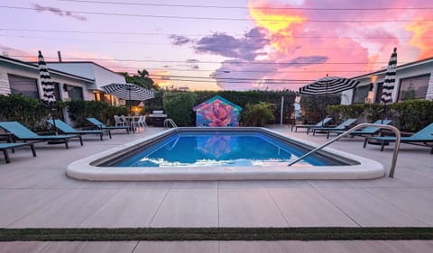 Our new Pier Walk pool house mural in progress... artist Dreamweaver at work on May 3rd 2023.