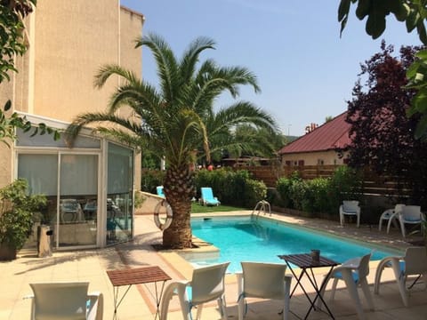 Take in gorgeous views while lounging around the on-site outdoor pool.