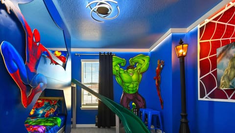 Kids will love the upstairs bedroom with a cool Spiderman theme