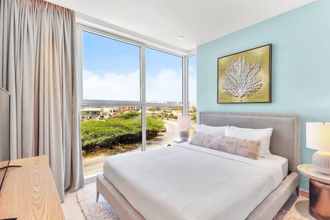 Bedroom 2 | High-quality linens, bedding, and plenty of cushions are provided for a relaxing vacation.