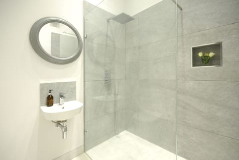 Deluxe House | Bathroom | Hair dryer, soap