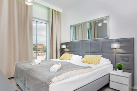 Comfortable double bed in the living room.