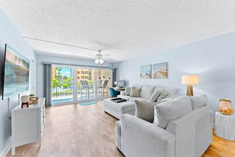 Bright and inviting living room with plush seating and a coastal vibe.