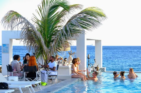 Outdoor pool, open 8 AM to 11:00 PM, free cabanas, pool umbrellas