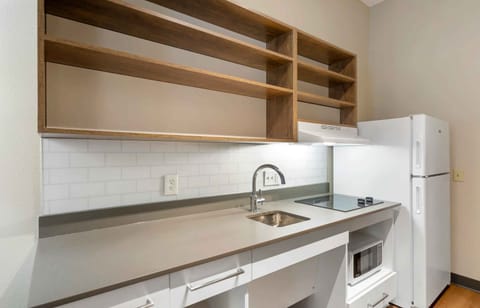 Studio, 1 Queen Bed, Non Smoking | Private kitchen | Full-size fridge, microwave, stovetop, coffee/tea maker