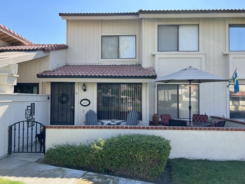 Front of the townhouse with patio for outdoor dining and relaxing