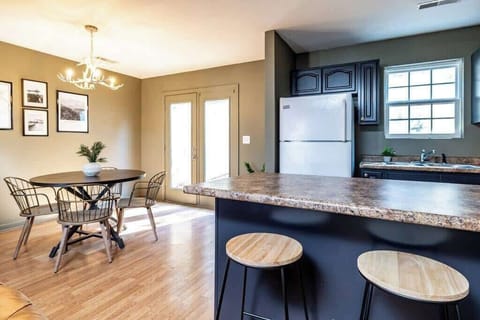 The kitchen has all the appliances you need!  Full with all the essentials and a fridge, microwave, oven, dishwasher, coffee machine and toaster.