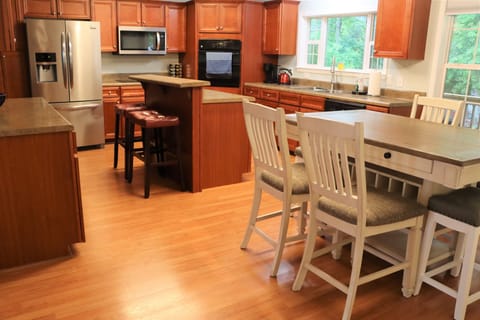 Fully stocked kitchen with plenty of seating!