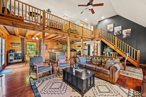 This is where rustic charm meets modern comfort! This open and inviting living space is the perfect spot to relax with family and friends.