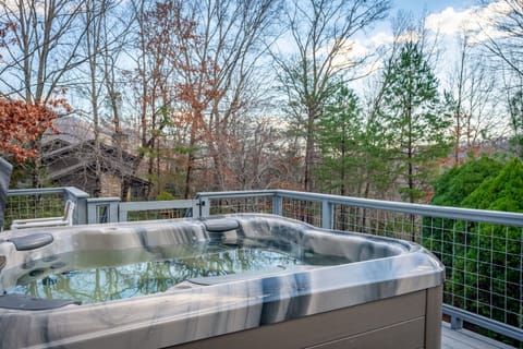 Enjoy the hot tub overlooking beautiful nature