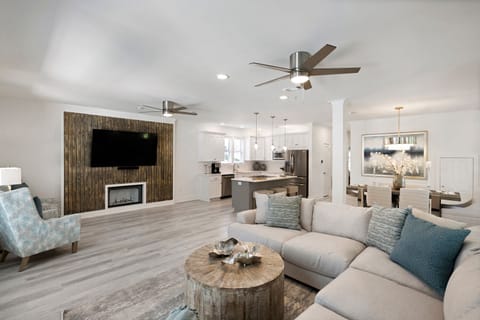 Open living, kitchen, and dining space