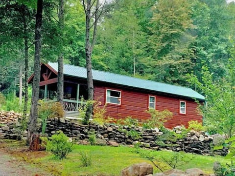 The cabin as you pull in the driveway