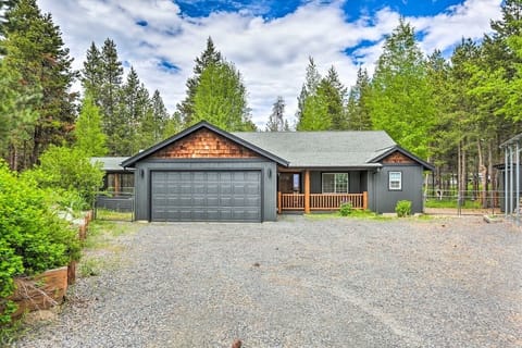 Large driveway comfortably fits four cars. One-level home