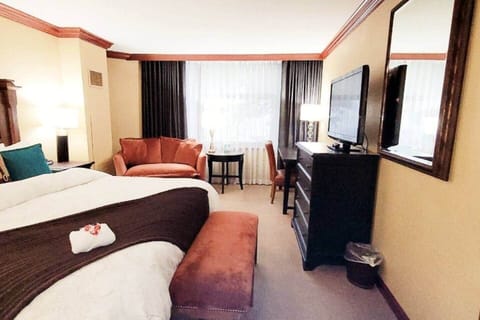 Spacious studio with king bed and love seat sleeper.   Premium cable