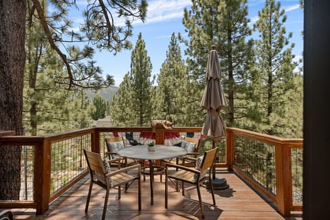 Enjoy this relaxed, romantic setting with outdoor seating and dining on a wood deck while enjoying amazing ski slope views from the top deck.