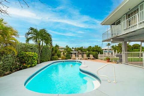 Luxury inground swimming pool in Marathon, Florida – custom-built for tropical Keys living, perfect for backyard retreats, vacation rentals, and professional pool construction in the Florida Keys