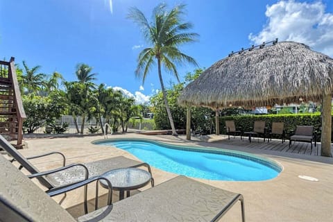 Cool off in your private pool surrounded by tropical landscaping and island charm.