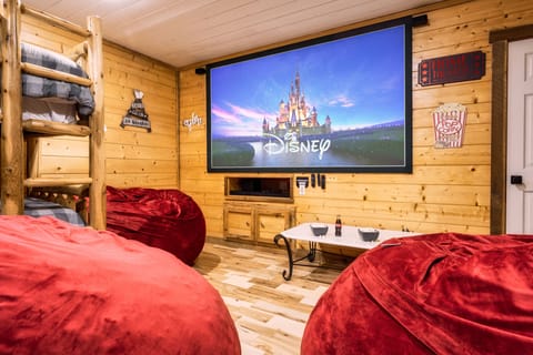 Downstairs you'll find the theater, pool table, bean bag chairs, & bunk beds!