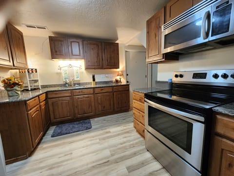 Downstairs kitchen, well equipped.