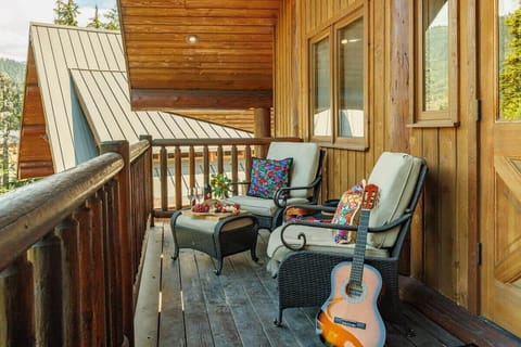 Beautiful upper floor mountain-view balcony with comfortable seating