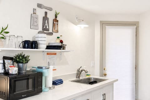 Kitchenette with all the supplies you need for basic meal prep.