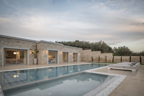 Sophisticated pool surroundings offering a sense of tranquility. 