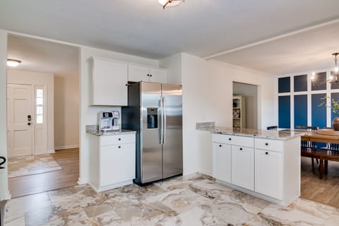 View of coffee station fully stocked with coffee, k-cups, tea and hot chocolate.