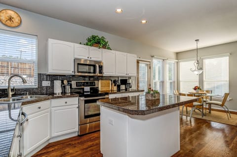 Spacious Kitchen-Complete w/ Bar Seating, Island, and an Eat-In Nook.