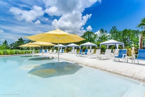 - Resort style pool with loungers umbrellas and sun shelf for relaxed days
- Shared swimming pool steps away perfect for cooling off after beach time
- Myrtle Beach vacation rental with pool deck seating and open skies 
