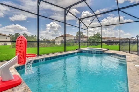 - Screened private pool with spa for Florida stays and family fun
- Sunny backyard views safe pool games ideal for kids and groups
- Vacation home with pool enclosure outdoor seating and relaxation