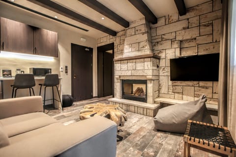 Premium Suite, Mountain View | Living area | 43-inch Smart TV with satellite channels, TV