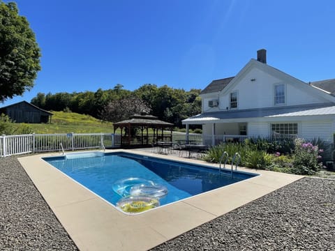 In ground pool and gazebo at Peterson Place