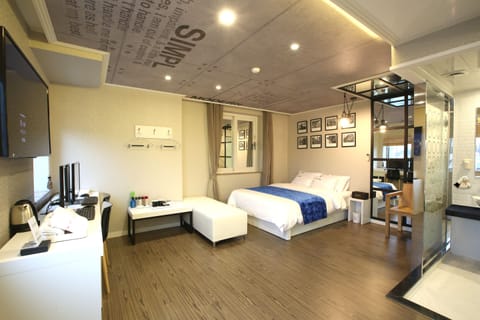 Luxury Twin Room | Down comforters, memory foam beds, individually decorated