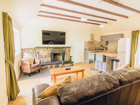 Large open plan kitchen and sitting area | Keepers Cottage - Dalnagar Castle And Cottages, Glenshee, Cairngorms