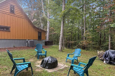 Private view of woods while enjoying firepit, grill and hot tub