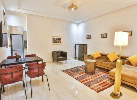 Bright open-plan living space with lounge and 43” Smart TV with Netflix.
