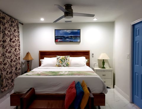 King bed, dresser, luggage rack, plenty of closet space with full mirror