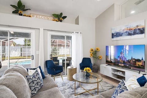 Living Room with 65` Smart TV & POOL View!