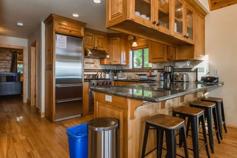 Open Concept Kitchen Plus Bar Stools