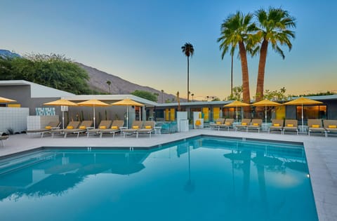 Outdoor pool, pool umbrellas, sun loungers