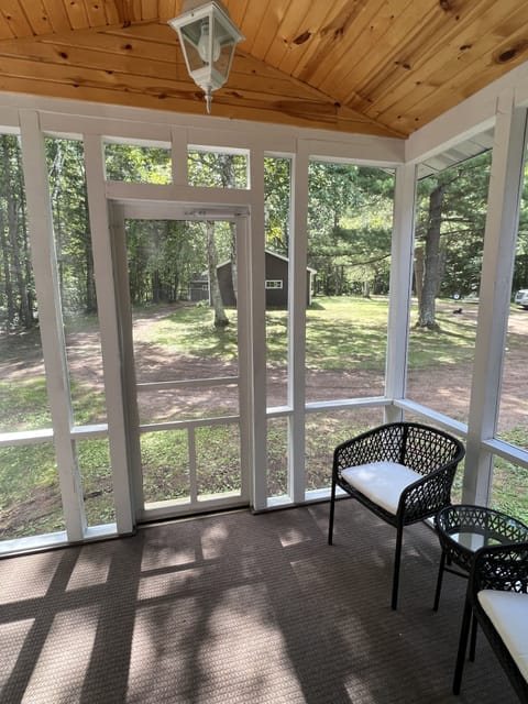 Porch off the master, perfect to relax and watch the deer