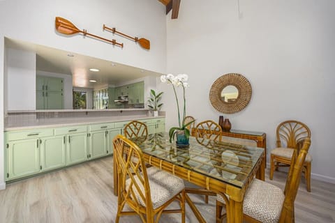 Dining area features buffet bar and can be set to seat 4 with 2 additional chairs available for larger groups.