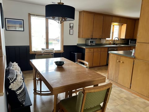 Dining Room with Flexible Seating. Table expands & 2 benches for more seating