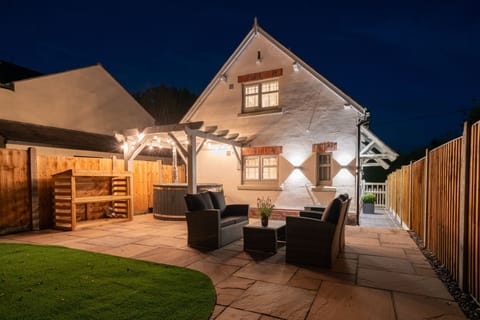 The private garden at night at Pilgrim Cottage, Cheshire