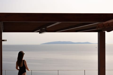 From the balcony you may cherish the Aegean Blue.