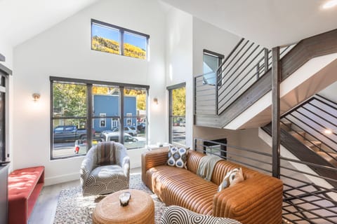 Living Room With Views ! - Enjoy Apre In this cozy living room with fireplace