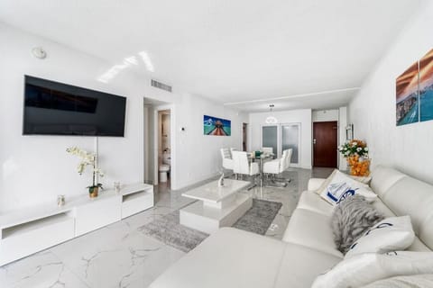 Spacious contemporary living area featuring comfortable seating and sleek design elements